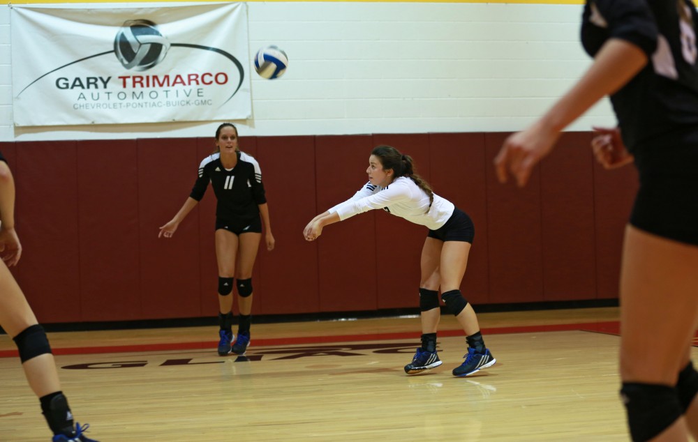 GVL / Kevin Sielaff
Taylor Shomin (2) hits the ball over the net. The Lakers fall to the Bulldogs at Ferris State University Sept. 29 by a margin of 3-1. 