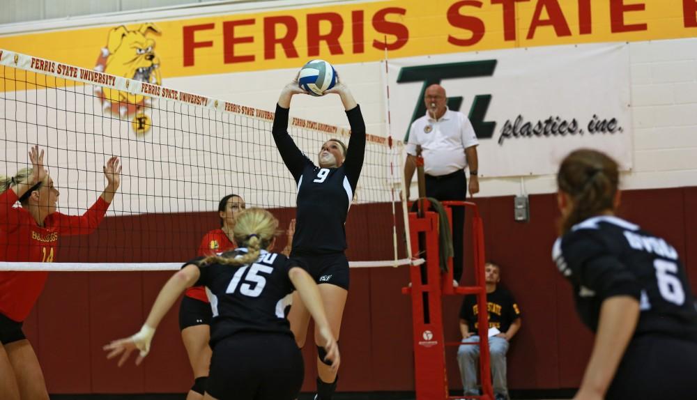 GVL / Kevin Sielaff
Katie Olson (9) sets the ball. The Lakers fall to the Bulldogs at Ferris State University Sept. 29 by a margin of 3-1.