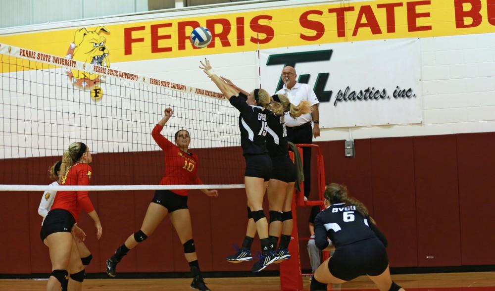 GVL / Kevin Sielaff
Kaleigh Lound (15) and Shannon Winicki (18) go up for a block. The Lakers fall to the Bulldogs at Ferris State University Sept. 29 by a margin of 3-1. 