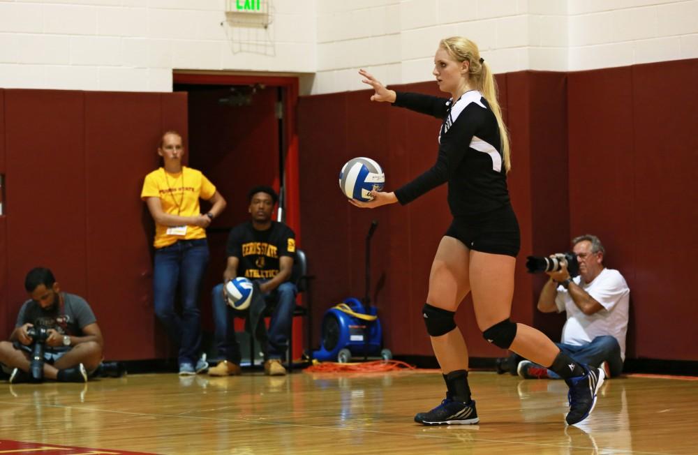 GVL / Kevin Sielaff
Staci Brower (21) serves the ball. The Lakers fall to the Bulldogs at Ferris State University Sept. 29 by a margin of 3-1. 