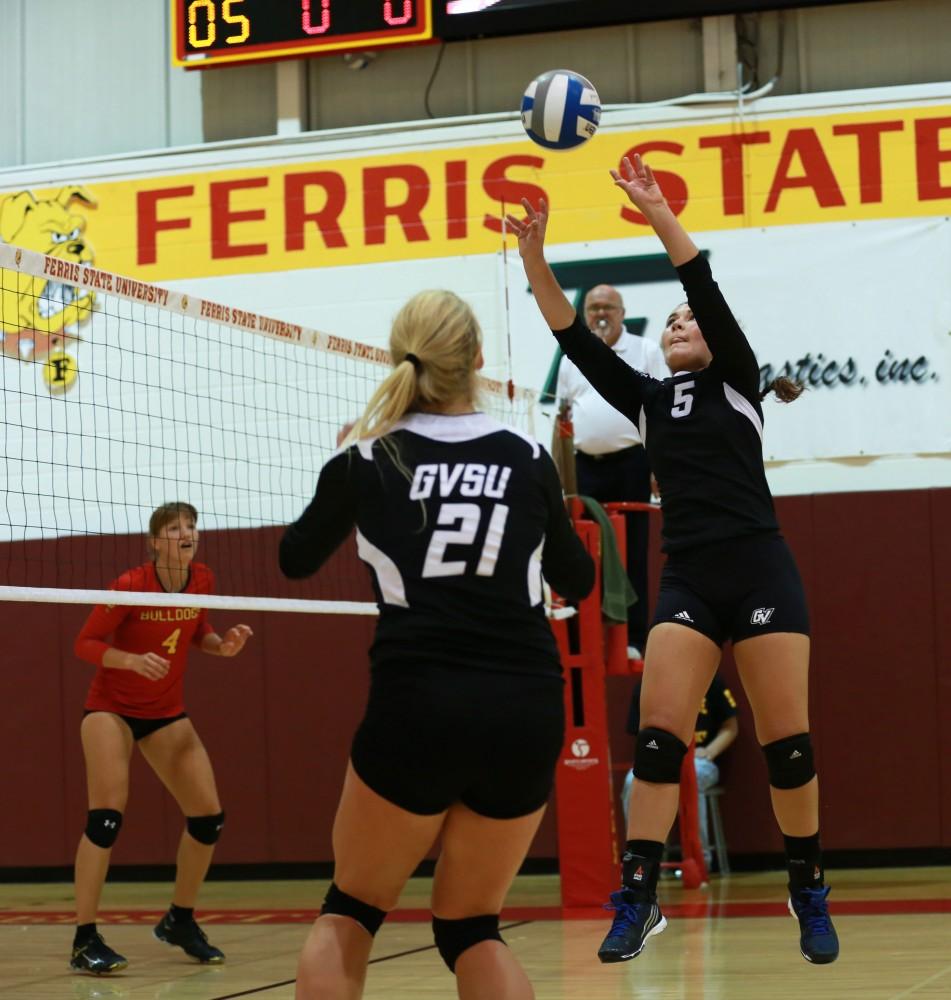 GVL / Kevin Sielaff
Taylor Stewart (5) sets the ball. The Lakers fall to the Bulldogs at Ferris State University Sept. 29 by a margin of 3-1.