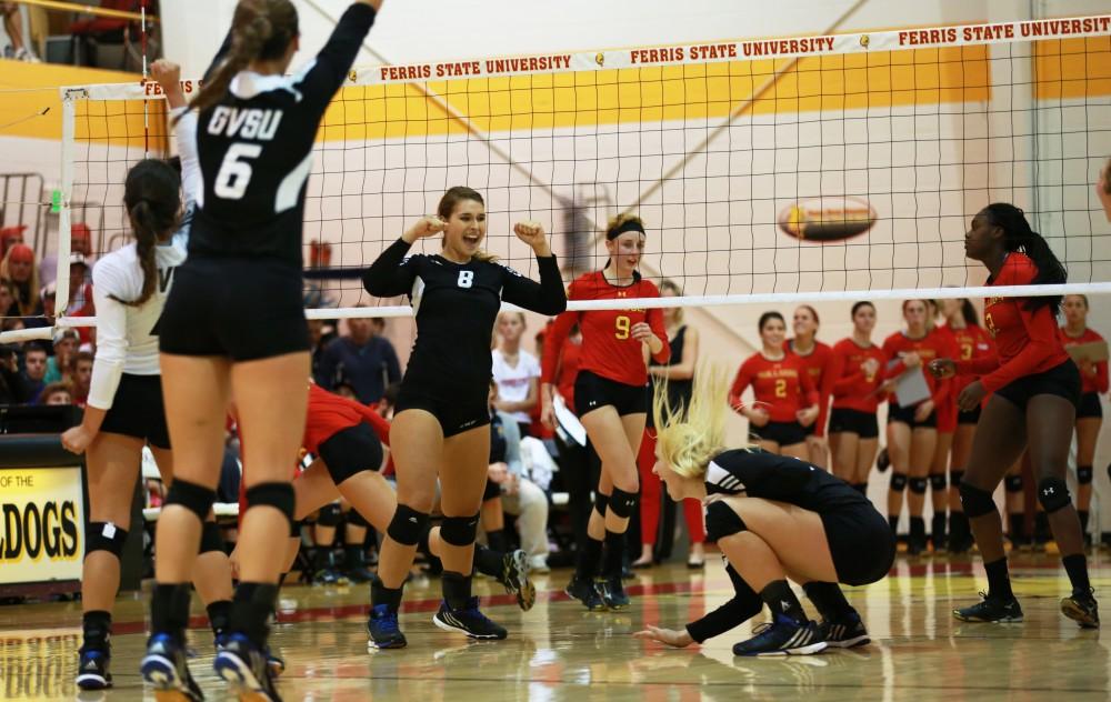 GVL / Kevin Sielaff
Brooke Smith (8) celebrates with her team. The Lakers fall to the Bulldogs at Ferris State University Sept. 29 by a margin of 3-1. 