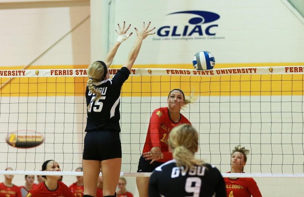 GVL / Kevin Sielaff
Kaleigh Lound (15) attempts a block. The Lakers fall to the Bulldogs at Ferris State University Sept. 29 by a margin of 3-1.