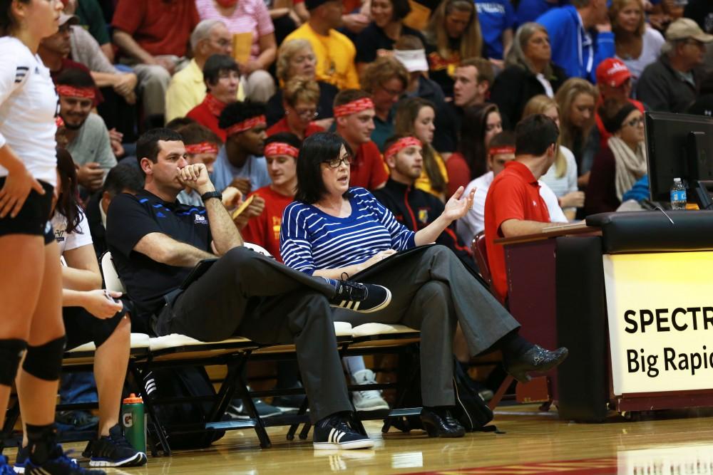 GVL / Kevin Sielaff
Head coach Deanne Scanlon talks strategy with associate head coach Jason Johnson. The Lakers fall to the Bulldogs at Ferris State University Sept. 29 by a margin of 3-1. 