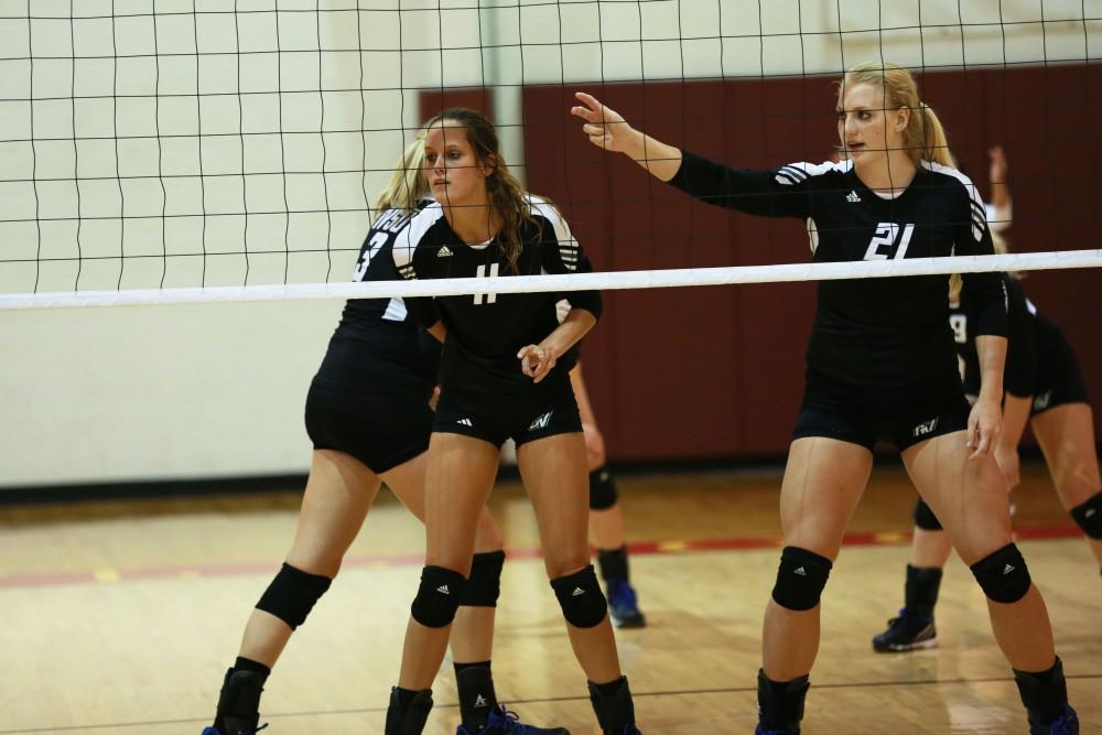 GVL / Kevin Sielaff
Kourtney Wolters (11) and Staci Brower (21) line up in front of the net. The Lakers fall to the Bulldogs at Ferris State University Sept. 29 by a margin of 3-1. 