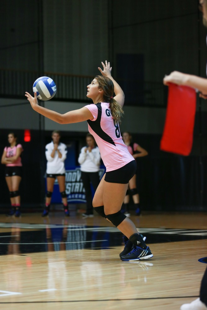 GVL / Kevin Sielaff - Brooke Smith (8) serves the ball. Grand Valley squares off against Ohio Dominican and claims the victory with a final score of 3-1.