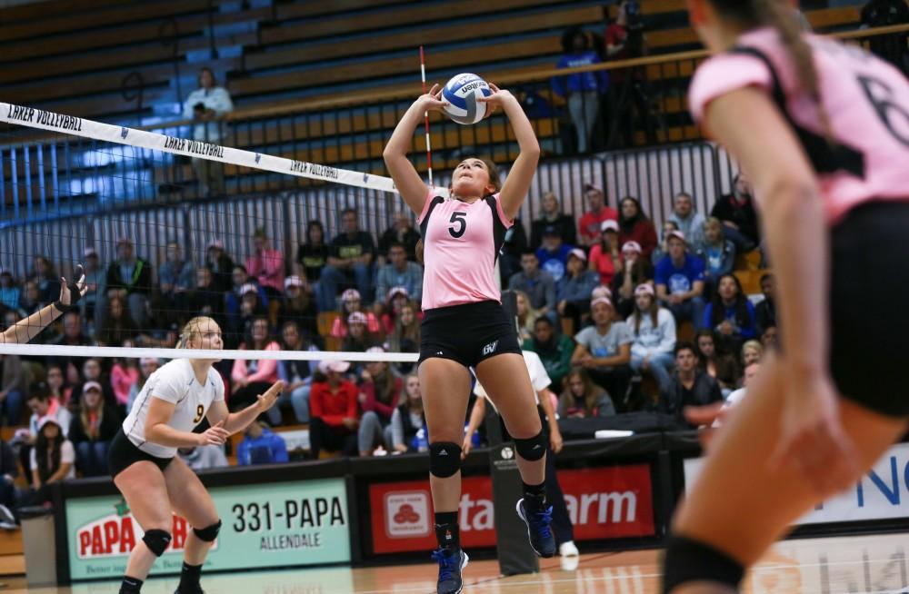 GVL / Kevin Sielaff - Taylor Stewart (5) sets the ball. Grand Valley squares off against Ohio Dominican and claims the victory with a final score of 3-1.