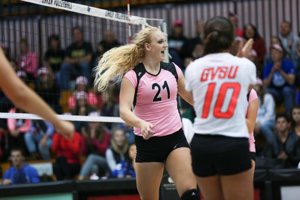 GVL / Kevin Sielaff - Staci Brower (21) celebrates after a point scored. Grand Valley squares off against Ohio Dominican and claims the victory with a final score of 3-1.