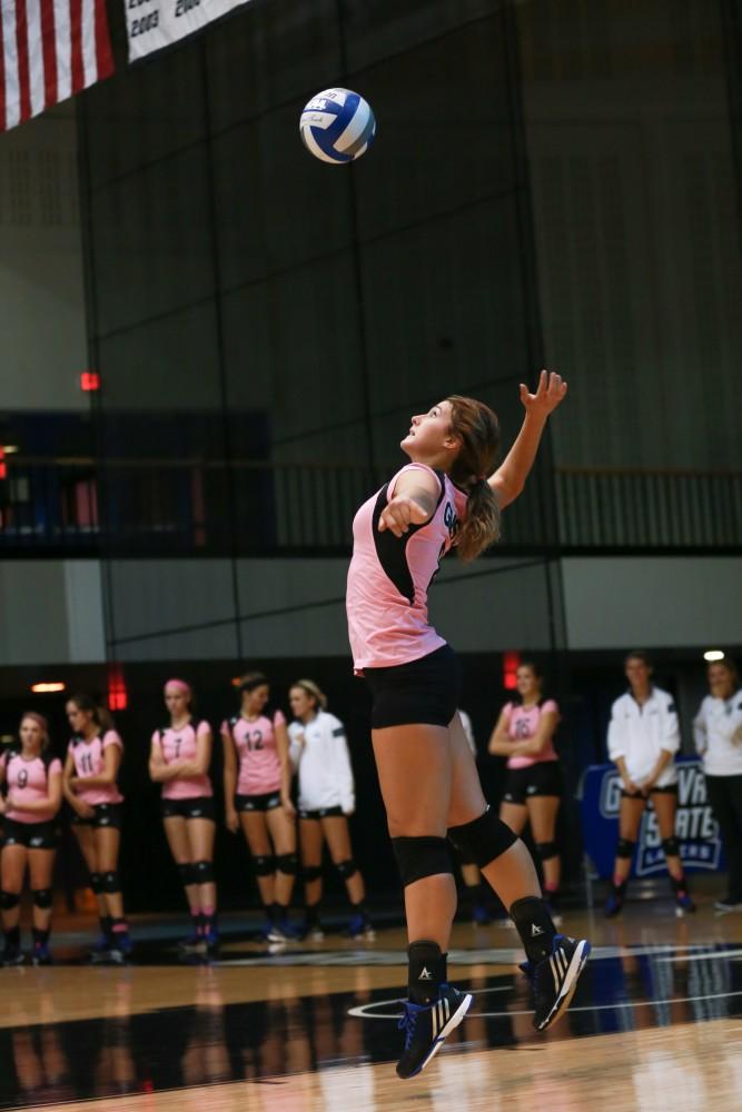 GVL / Kevin Sielaff - Brooke Smith (8) serves the ball. Grand Valley squares off against Ohio Dominican and claims the victory with a final score of 3-1.