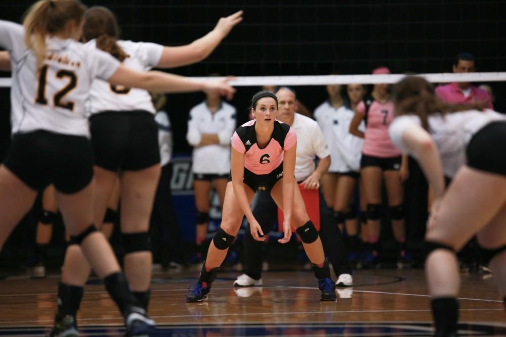 GVL / Kevin Sielaff - Betsy Rhonda (6) prepares to receive a serve. Grand Valley squares off against Ohio Dominican and claims the victory with a final score of 3-1.