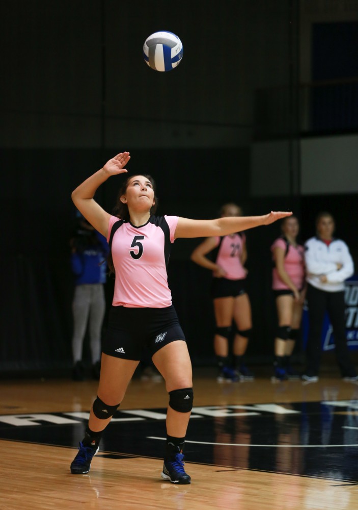 GVL / Kevin Sielaff - Taylor Stewart (5) serves the ball. Grand Valley squares off against Ohio Dominican and claims the victory with a final score of 3-1.