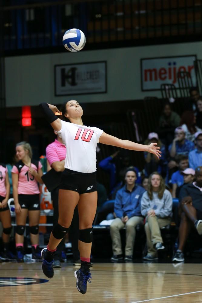 GVL / Kevin Sielaff - Taylor Shomin (2) serves the ball. Grand Valley squares off against Ohio Dominican and claims the victory with a final score of 3-1.