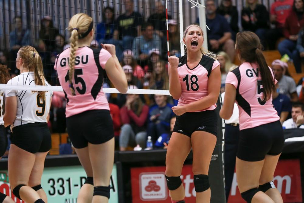 GVL / Kevin Sielaff - Shannon Winicki (18) celebrates after a point scored. Grand Valley squares off against Ohio Dominican and claims the victory with a final score of 3-1.