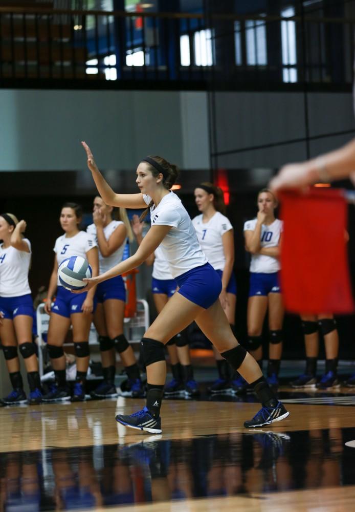 GVL / Kevin Sielaff - Betsy Rhonda (6) serves the ball. Grand Valley sweeps Tiffin Oct. 3 after three sets inside the Fieldhouse Arena in Allendale.