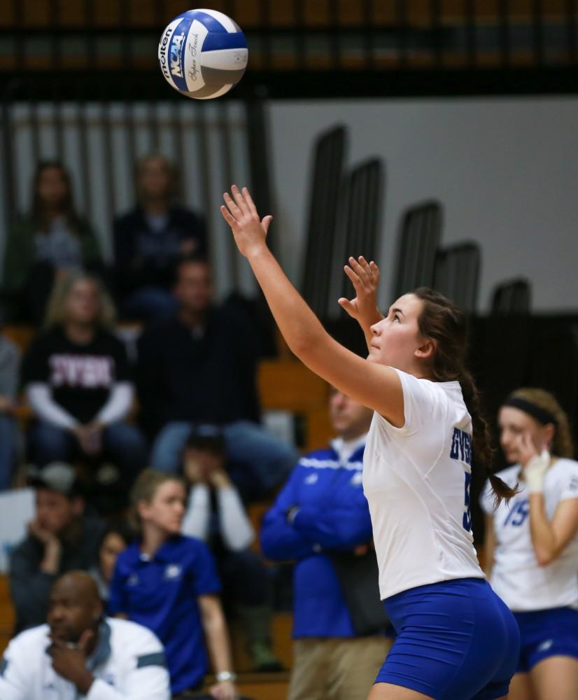 GVL / Kevin Sielaff - Taylor Stewart (5) serves the ball. Grand Valley sweeps Tiffin Oct. 3 after three sets inside the Fieldhouse Arena in Allendale.