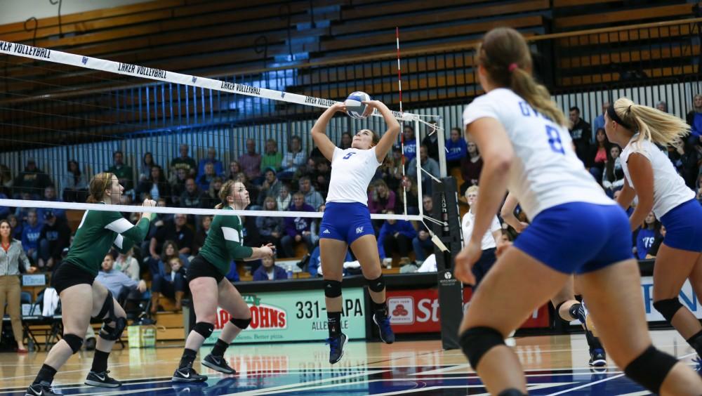 GVL / Kevin Sielaff - Taylor Stewart (5) sets the ball. Grand Valley sweeps Tiffin Oct. 3 after three sets inside the Fieldhouse Arena in Allendale.