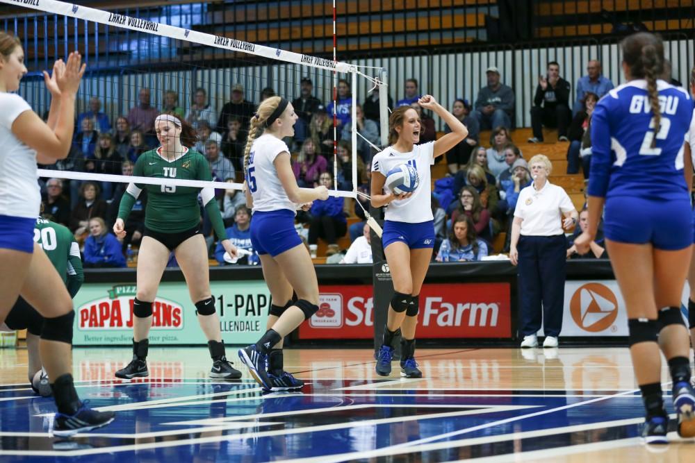 GVL / Kevin Sielaff - Kourtney Wolters (11) celebrates after a point scored. Grand Valley sweeps Tiffin Oct. 3 after three sets inside the Fieldhouse Arena in Allendale.