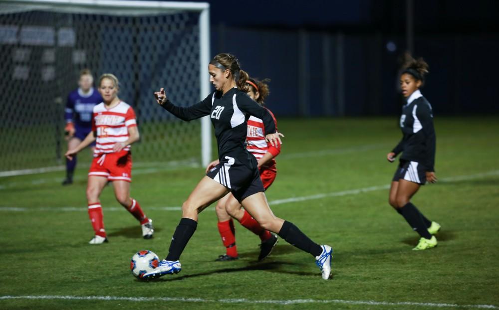 GVL / Kevin Sielaff - Gabriella Mencotti (20) carries the ball toward the opposing keeper.  The Lakers defeat the Bulldogs with a final score of 2-0 Oct. 30 in Allendale. Grand Valley will advance to the GLIAC tournament starting Nov. 3.