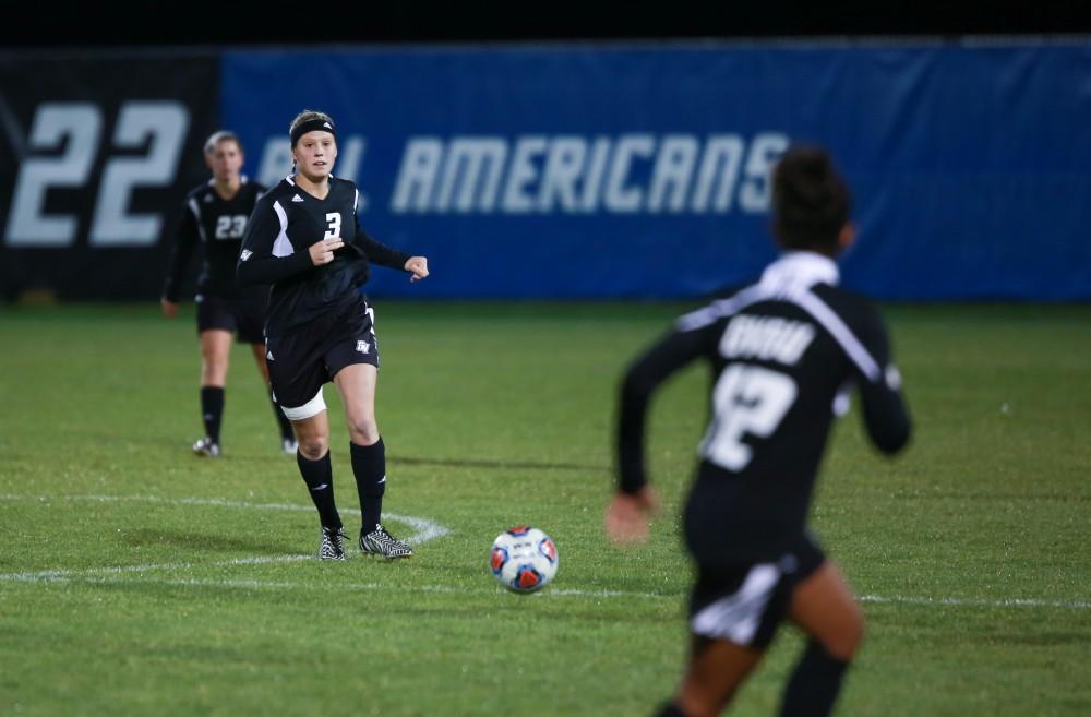 GVL / Kevin Sielaff -  Gabbie Guibord (3) passes the ball to Jayma Martin (12).  The Lakers defeat the Bulldogs with a final score of 2-0 Oct. 30 in Allendale. Grand Valley will advance to the GLIAC tournament starting Nov. 3.