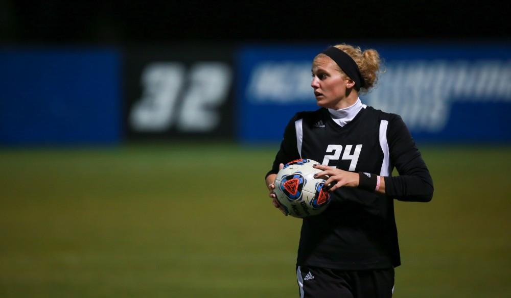 GVL / Kevin Sielaff -  Tracey McCoy (24) prepares to throw the ball in bounds.  The Lakers defeat the Bulldogs with a final score of 2-0 Oct. 30 in Allendale. Grand Valley will advance to the GLIAC tournament starting Nov. 3.