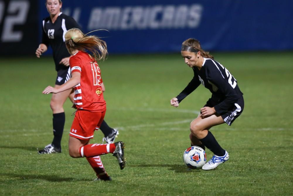 GVL / Kevin Sielaff - Gabriella Mencotti (20) stops the ball and changes direction in Ferris' zone.  The Lakers defeat the Bulldogs with a final score of 2-0 Oct. 30 in Allendale. Grand Valley will advance to the GLIAC tournament starting Nov. 3.