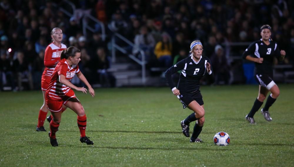 GVL / Kevin Sielaff - Katie klunder (2) looks to cross the ball.  The Lakers defeat the Bulldogs with a final score of 2-0 Oct. 30 in Allendale. Grand Valley will advance to the GLIAC tournament starting Nov. 3.