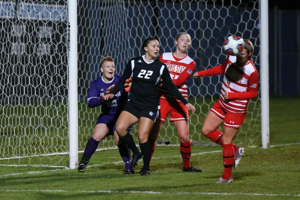 GVL / Kevin Sielaff  -  Smantha Riga (22) looks to head the ball into the net, but the ball is deflected. The Lakers defeat the Bulldogs with a final score of 2-0 Oct. 30 in Allendale. Grand Valley will advance to the GLIAC tournament starting Nov. 3.