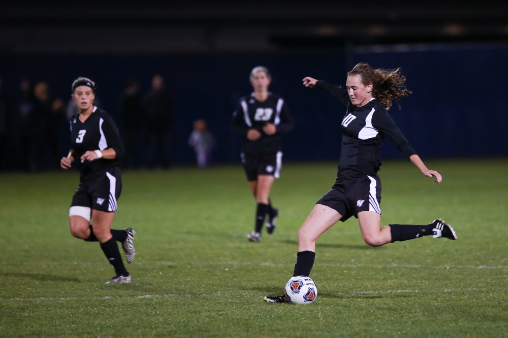 GVL / Kevin Sielaff - Shannon Quinn (10) tries a shot.  The Lakers defeat the Bulldogs with a final score of 2-0 Oct. 30 in Allendale. Grand Valley will advance to the GLIAC tournament starting Nov. 3.