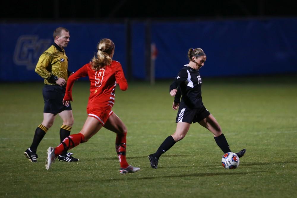 GVL / Kevin Sielaff -  Dani Johnson (16) plays the ball around midfield.  The Lakers defeat the Bulldogs with a final score of 2-0 Oct. 30 in Allendale. Grand Valley will advance to the GLIAC tournament starting Nov. 3.