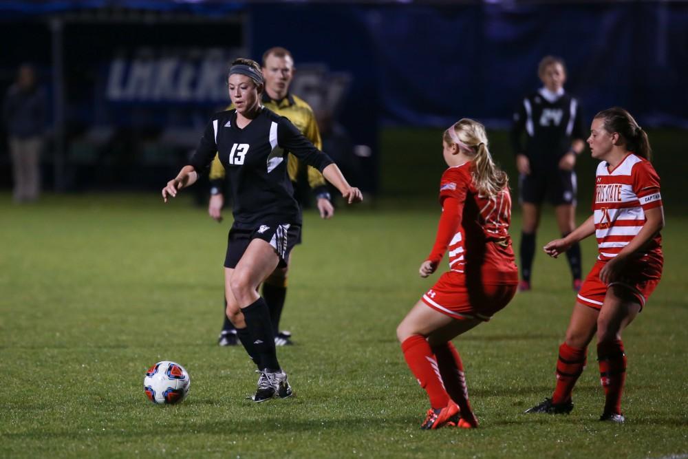 GVL / Kevin Sielaff -  Marti Corby (13) looks to set up a play.  The Lakers defeat the Bulldogs with a final score of 2-0 Oct. 30 in Allendale. Grand Valley will advance to the GLIAC tournament starting Nov. 3.