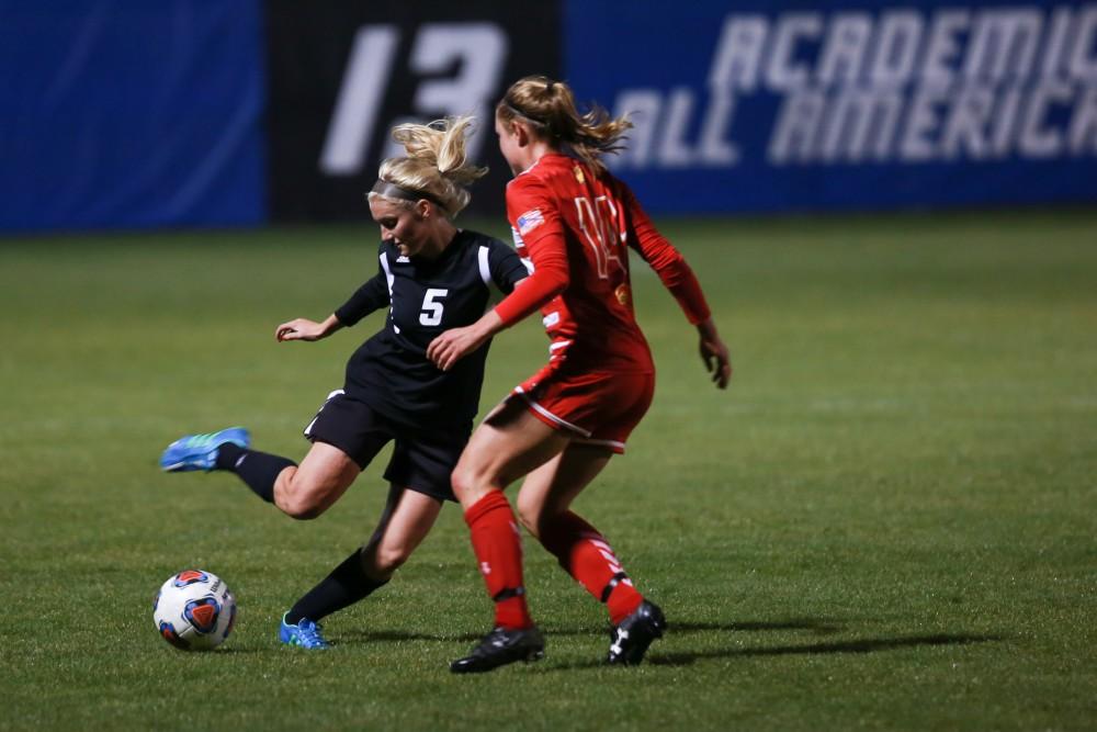 GVL / Kevin Sielaff -  Kendra Stauffer (5) dances around Ferris'defense.  The Lakers defeat the Bulldogs with a final score of 2-0 Oct. 30 in Allendale. Grand Valley will advance to the GLIAC tournament starting Nov. 3.