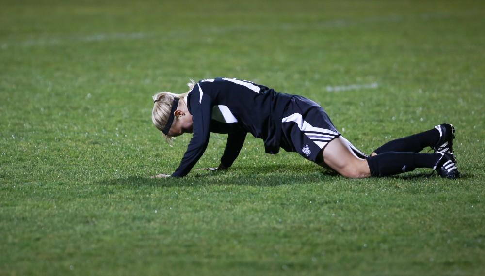 GVL / Kevin Sielaff - Maddison Reynolds (18) slowly rises from the turf after her goal.  The Lakers defeat the Bulldogs with a final score of 2-0 Oct. 30 in Allendale. Grand Valley will advance to the GLIAC tournament starting Nov. 3.