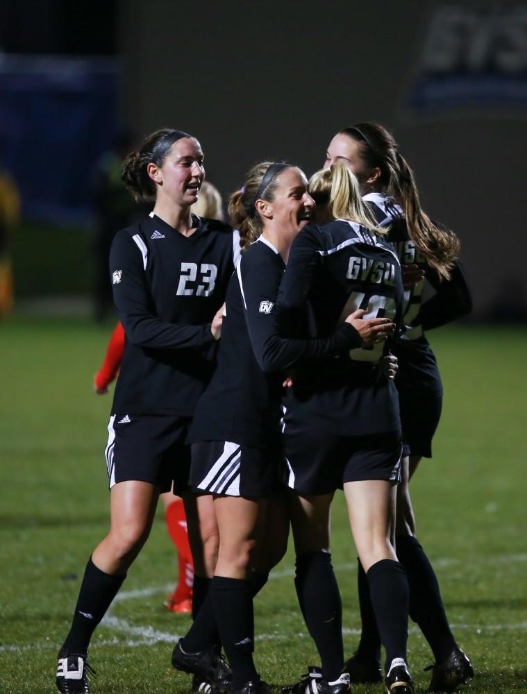 GVL / Kevin Sielaff - Dani Johnson (16) celebrates with Maddison Reynolds (18).  The Lakers defeat the Bulldogs with a final score of 2-0 Oct. 30 in Allendale. Grand Valley will advance to the GLIAC tournament starting Nov. 3.