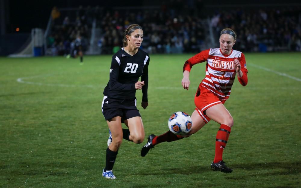 GVL / Kevin Sielaff -  Gabriella Mencotti (20) chases the ball down with Ferris' Erica Bartlett (3) on her tail.  The Lakers defeat the Bulldogs with a final score of 2-0 Oct. 30 in Allendale. Grand Valley will advance to the GLIAC tournament starting Nov. 3.