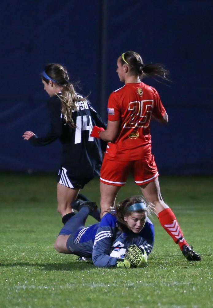 GVL / Kevin Sielaff - Emily Maresh (0) dives to make a save.  The Lakers defeat the Bulldogs with a final score of 2-0 Oct. 30 in Allendale. Grand Valley will advance to the GLIAC tournament starting Nov. 3.