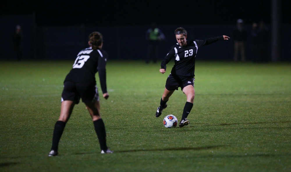 GVL / Kevin Sielaff - Katy Woolley (23) tries a shot.  The Lakers defeat the Bulldogs with a final score of 2-0 Oct. 30 in Allendale. Grand Valley will advance to the GLIAC tournament starting Nov. 3.