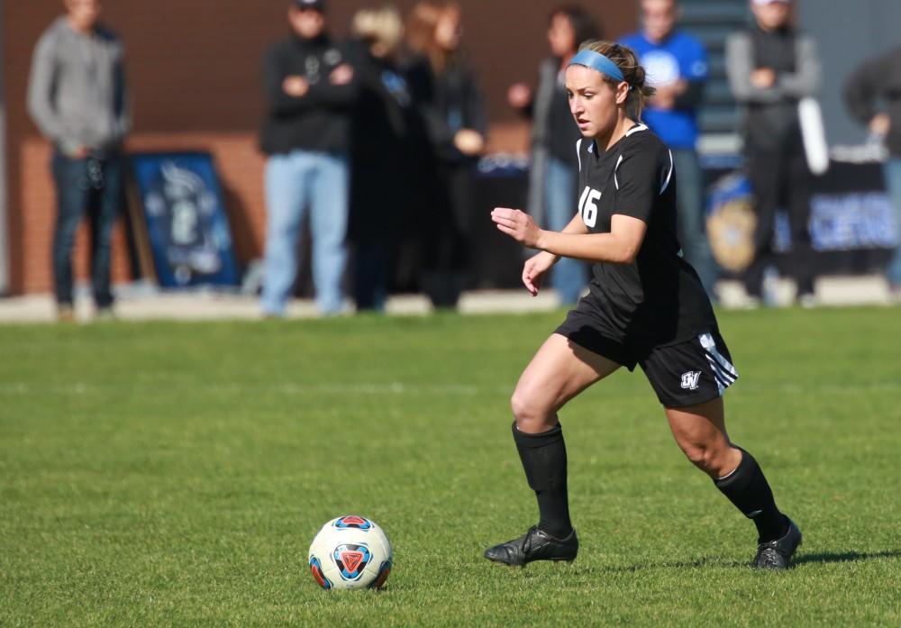 GVL / Kevin Sielaff - Dani Johnson (16) juggles with the ball around mid field.  Grand Valley's women's soccer team squares off against Northern Michigan Oct. 18 and wins with a final score of 7-0.