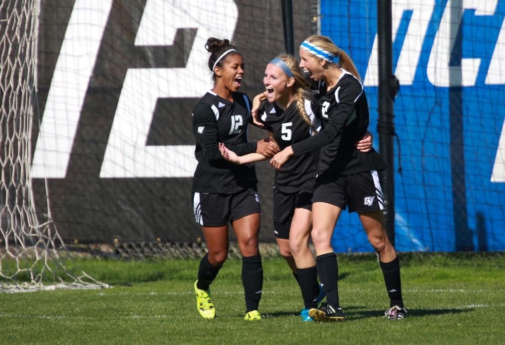 GVL / Kevin Sielaff - Kendra Stauffer (5) celebrates a redirected goal.  Grand Valley's women's soccer team squares off against Northern Michigan Oct. 18 and wins with a final score of 7-0.