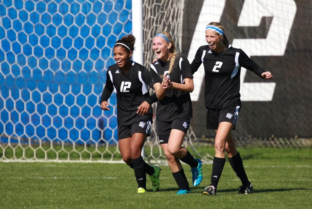 GVL / Kevin Sielaff - Kendra Stauffer (5) celebrates a four goal game.  Grand Valley's women's soccer team squares off against Northern Michigan Oct. 18 and wins with a final score of 7-0.