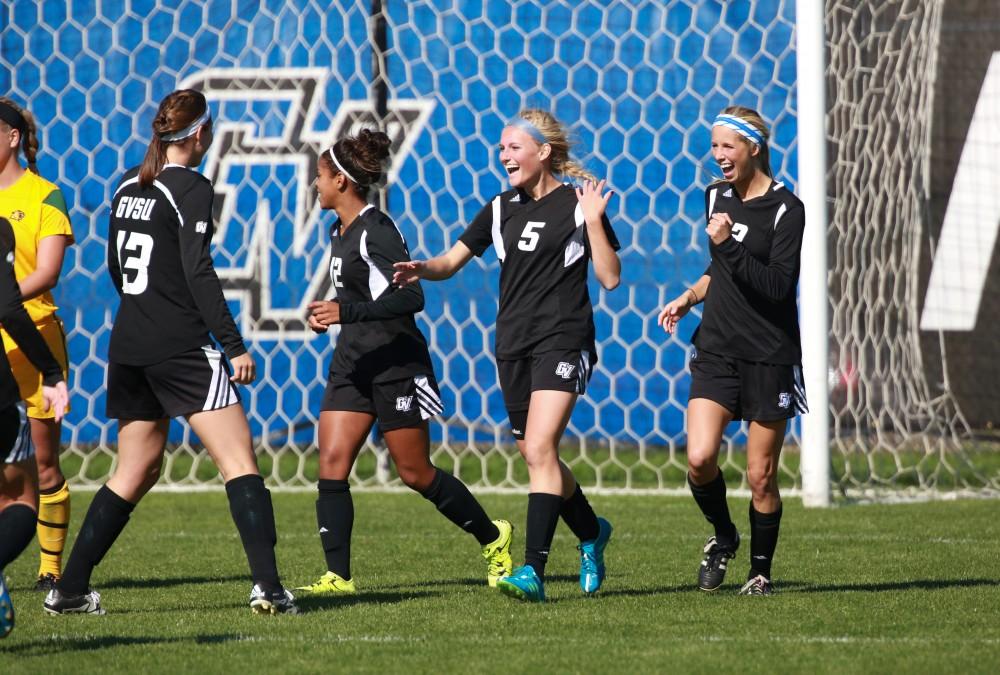 GVL / Kevin Sielaff - Kendra Stauffer (5) celebrates a four goal game.  Grand Valley's women's soccer team squares off against Northern Michigan Oct. 18 and wins with a final score of 7-0.