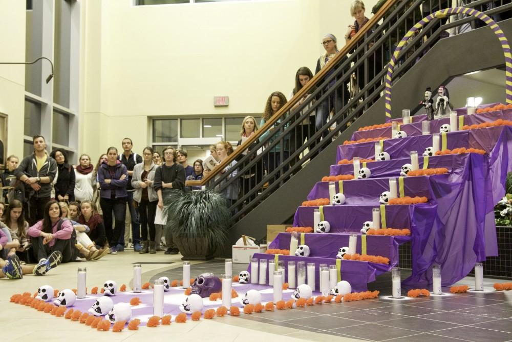 GVL / Sara Carte
Mexican artist, Roli Mancera, built the Day of the Dead’s holiday traditional alter for the celebration of  Day of the Dead at the Honors College on Allendale’s Campus on Nov. 2.