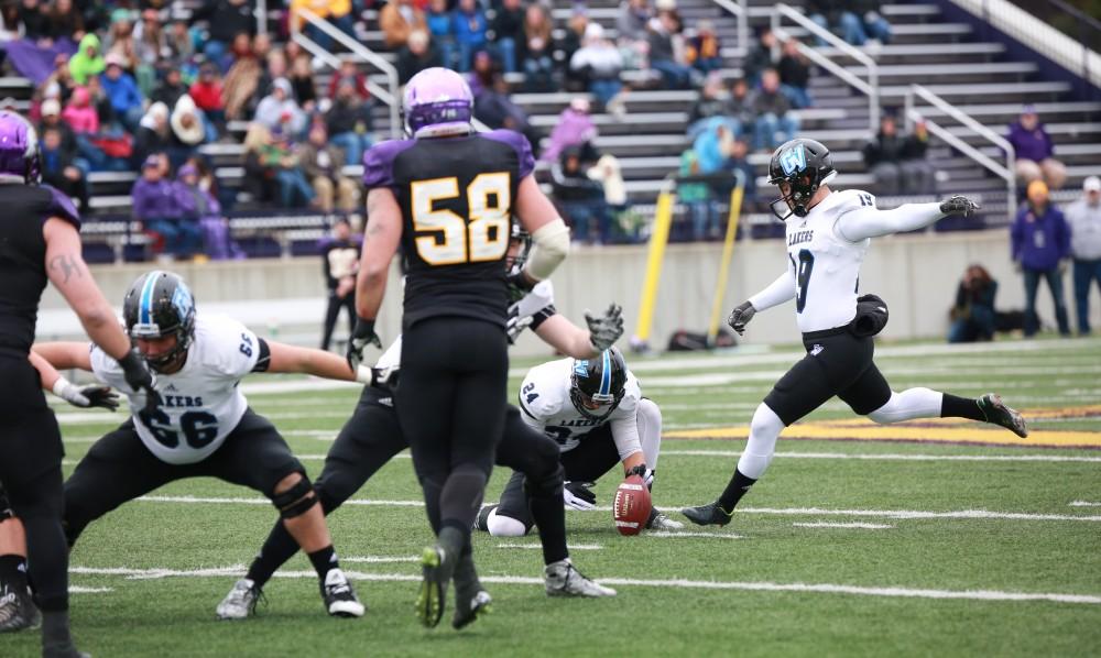 GVL / Kevin Sielaff - Joel Schipper (19) attempts a field goal.  Grand Valley defeats Ashland with a final score of 45-28 Nov. 22 at Ashland University.