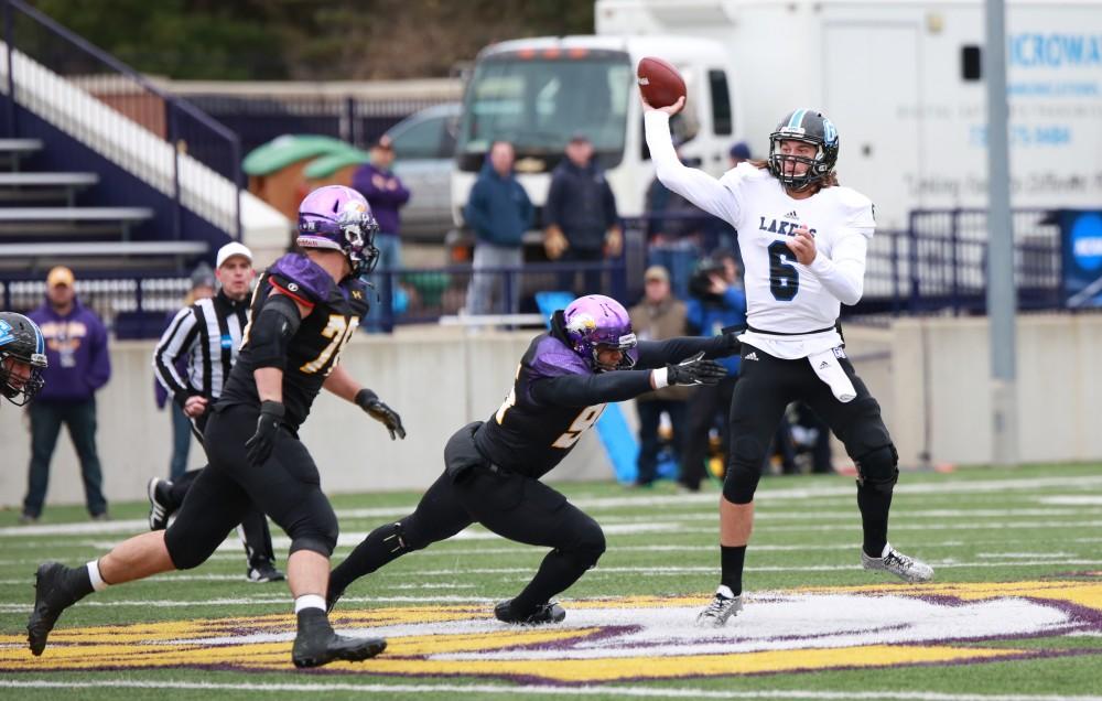 GVL / Kevin Sielaff - Bart Williams (6), under pressure, throws a short pass down field.  Grand Valley defeats Ashland with a final score of 45-28 Nov. 22 at Ashland University.