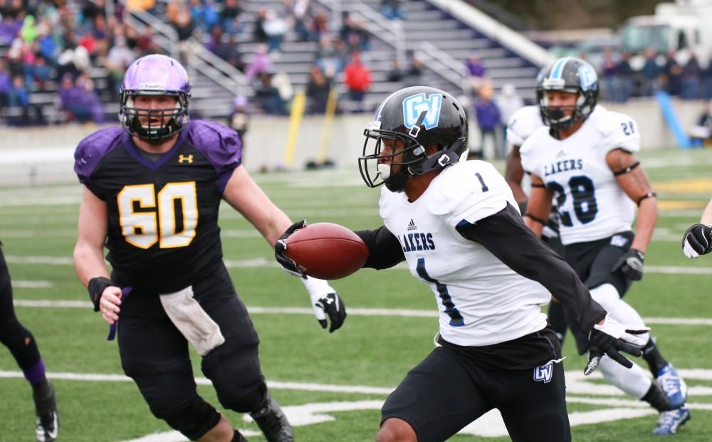 GVL / Kevin Sielaff - Devin McKissic (1) intercepts the ball and starts a run down field.  Grand Valley defeats Ashland with a final score of 45-28 Nov. 22 at Ashland University.