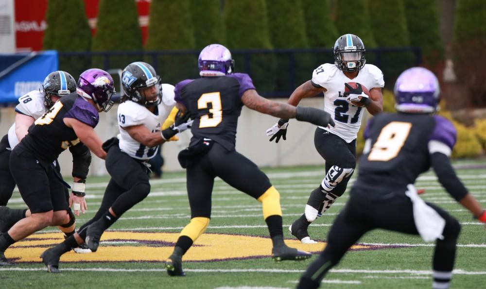 GVL / Kevin Sielaff - Kirk Spencer (27) makes a run down field.  Grand Valley defeats Ashland with a final score of 45-28 Nov. 22 at Ashland University.