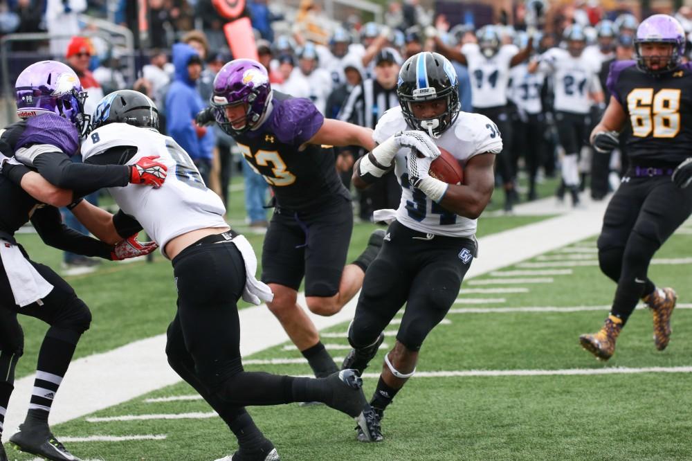 GVL / Kevin Sielaff - Marty Carter (34) dances his way into the end zone.  Grand Valley defeats Ashland with a final score of 45-28 Nov. 22 at Ashland University.