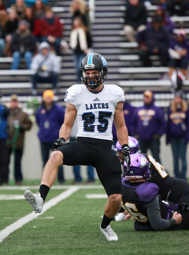 GVL / Kevin Sielaff - Garret Pougnet (25) celebrates a sack.  Grand Valley defeats Ashland with a final score of 45-28 Nov. 22 at Ashland University.