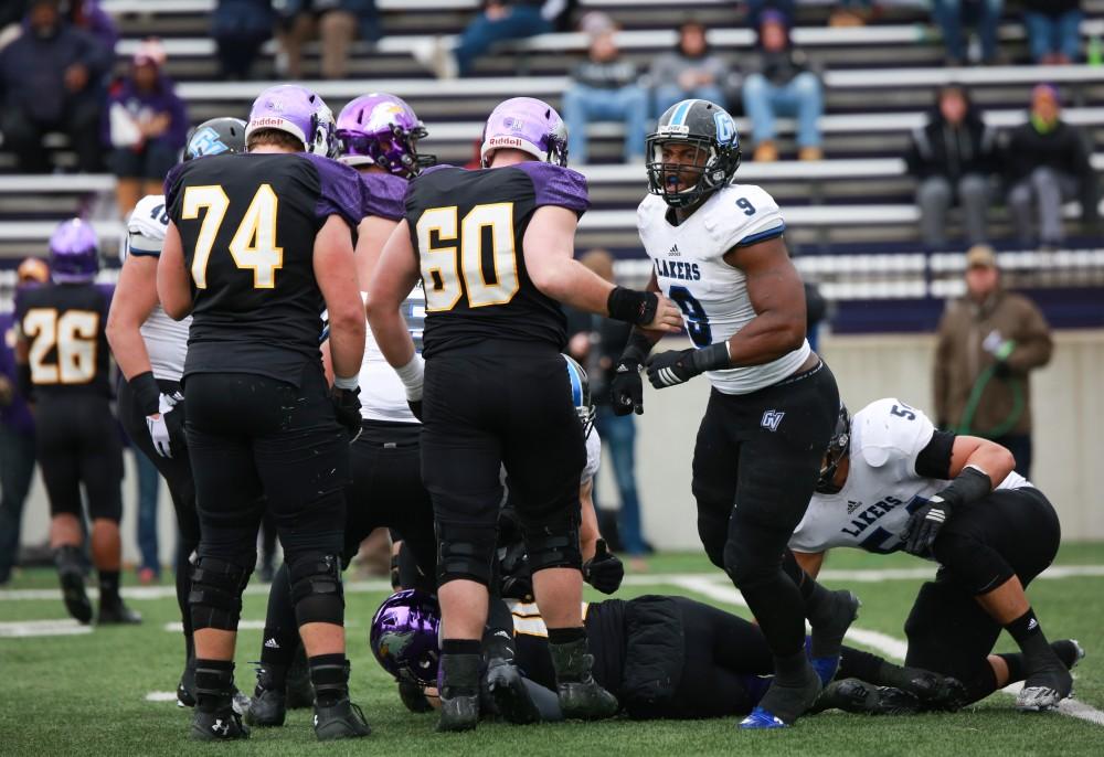 GVL / Kevin Sielaff - Matt Judon (9) celebrates a career high season, having broken Grand Valley's all-time record for sacks.  Grand Valley defeats Ashland with a final score of 45-28 Nov. 22 at Ashland University.