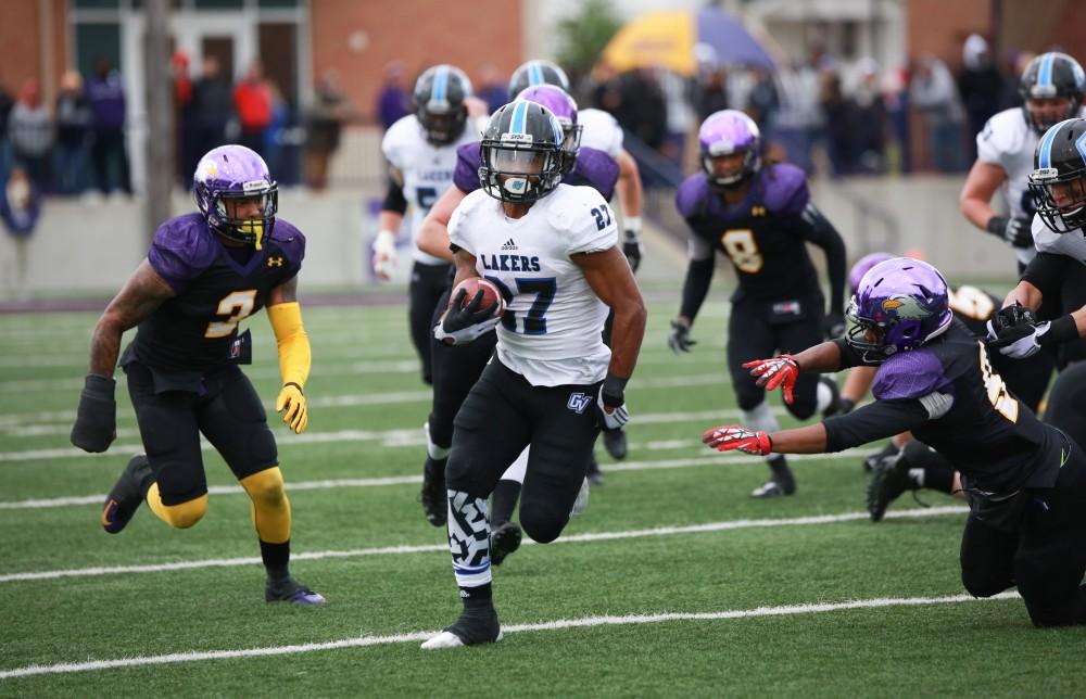 GVL / Kevin Sielaff - Kirk Spencer (27) runs the ball down field.  Grand Valley defeats Ashland with a final score of 45-28 Nov. 22 at Ashland University.