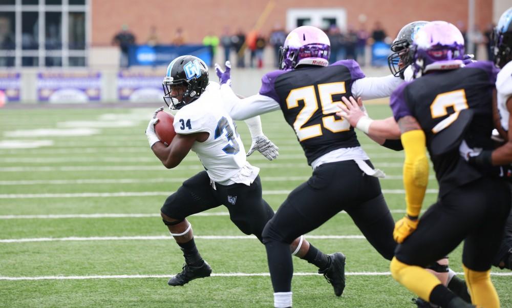 GVL / Kevin Sielaff - Marty Carter (34) dances toward the end zone.  Grand Valley defeats Ashland with a final score of 45-28 Nov. 22 at Ashland University.